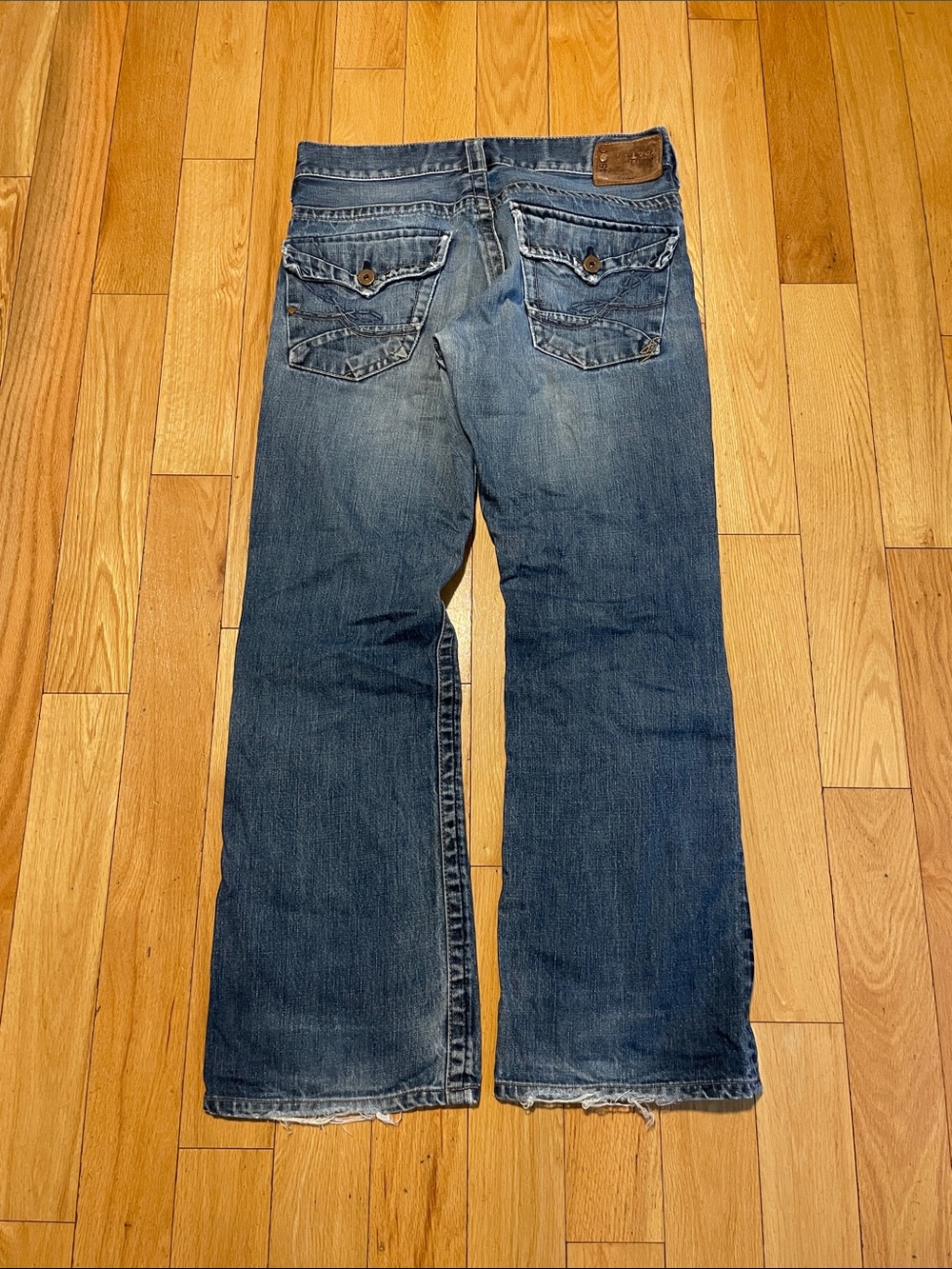 Silver Jeans Men's Blue Bootcut Denim with Button-Flap Back Pockets